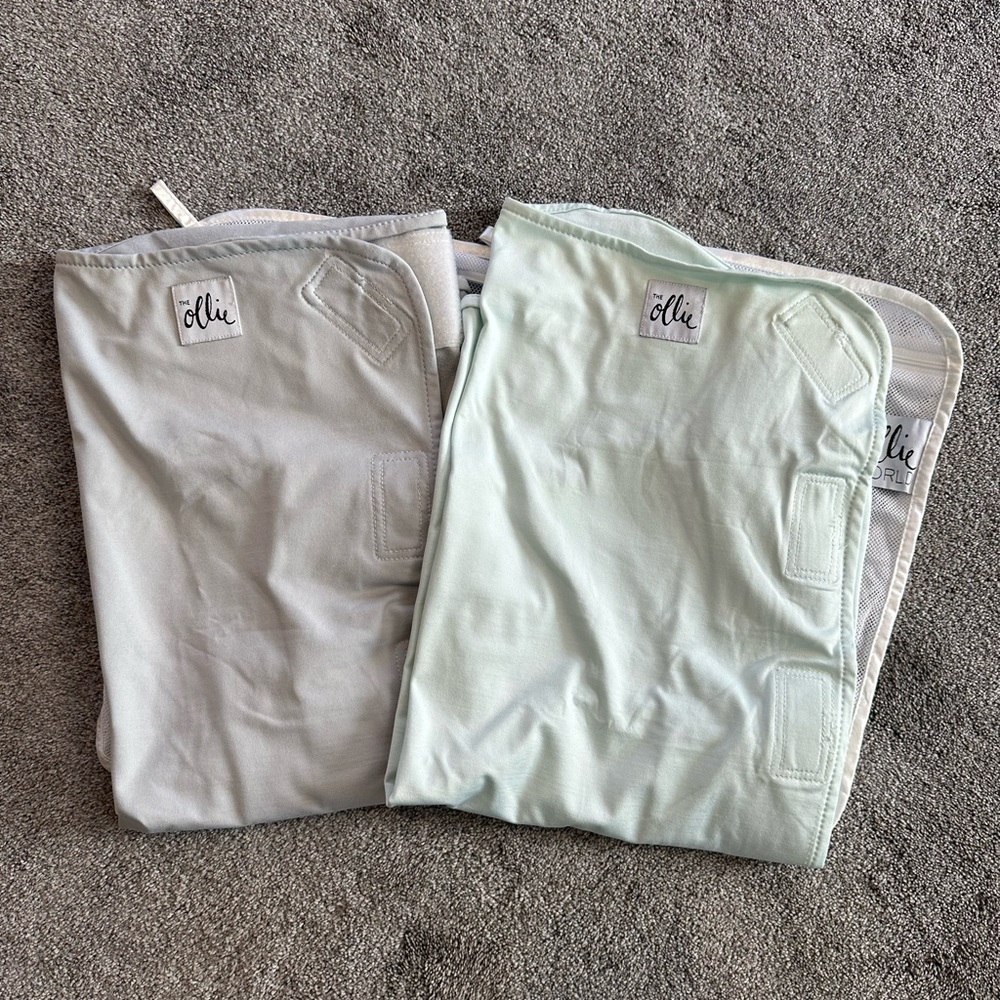 Ollie Swaddles in good used condition, no stains
Stone and Mint color
